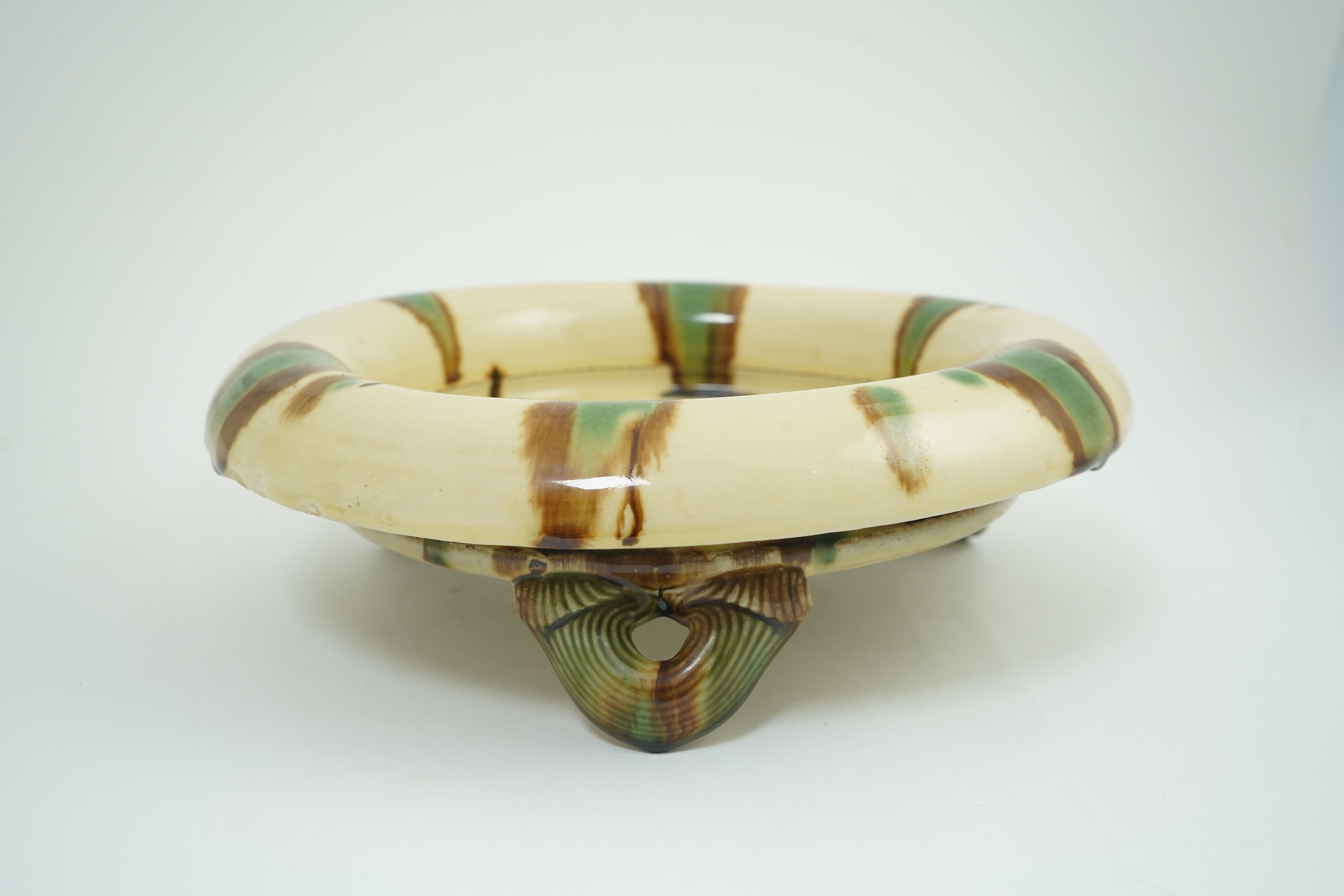 Takeshi Yasuda (Japanese, b.1943): A tricolour stoneware tripod planter